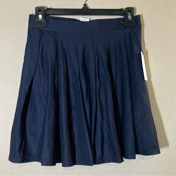 We wore what pleated tennis skort - Picture 6 of 9